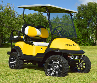 Sunshine Yellow Club Car Precedent Golf Cart with Front Bursh Bar and High Speed Motor at Key Largo Golf Carts